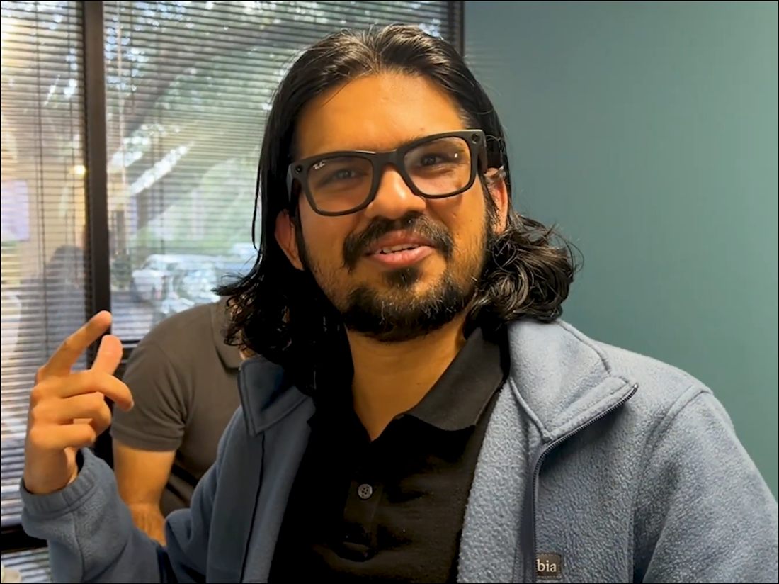 Dr. Prabhu demos Meta smart glasses at the UCF Healthy Aging Fair (1:28–1:38).